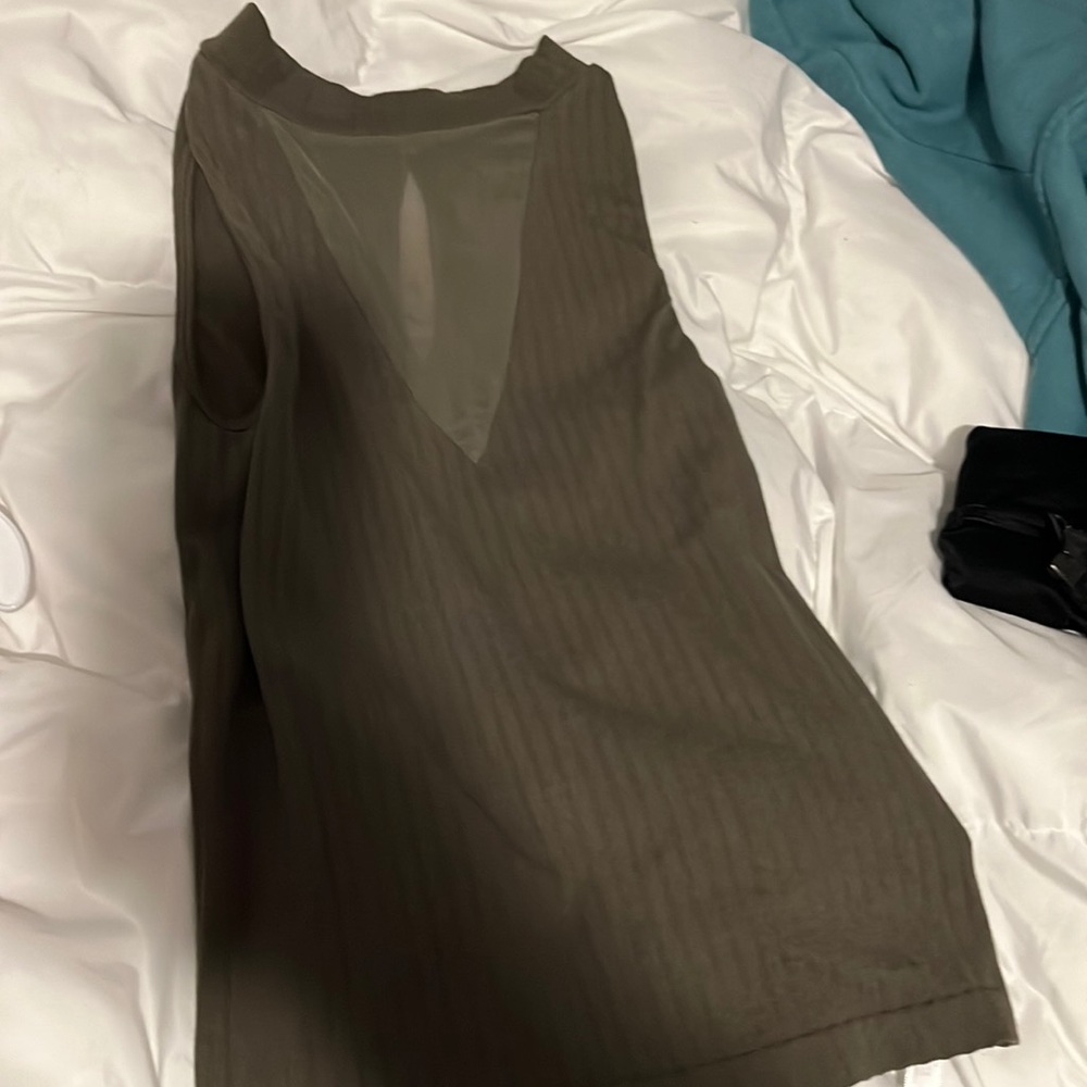 Dark green part mesh no sleeves top.